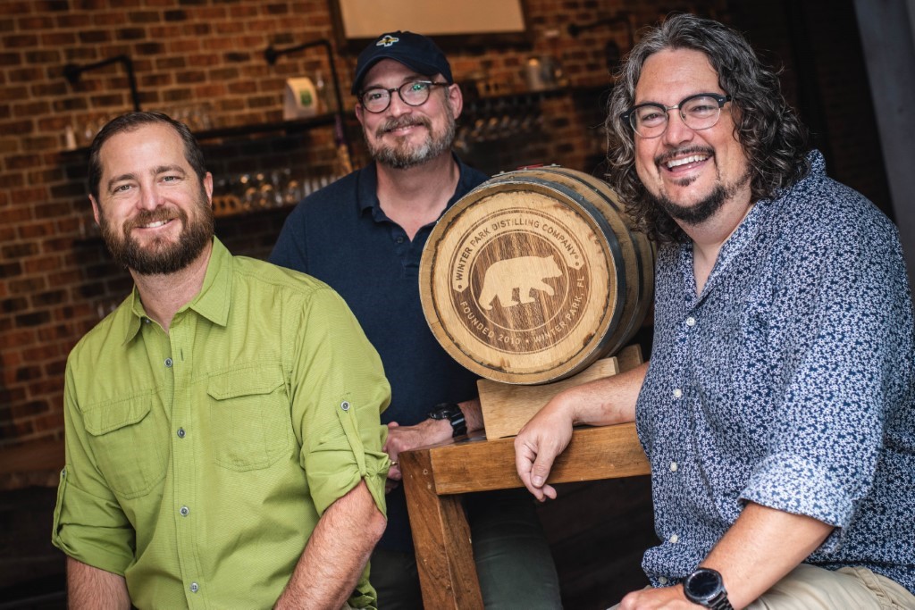 Paul Smerge, Andrew Asher and Paul Twyford, members of the Winter Park Distilling Company team pictured from left to right at the award-winning craft distillery.