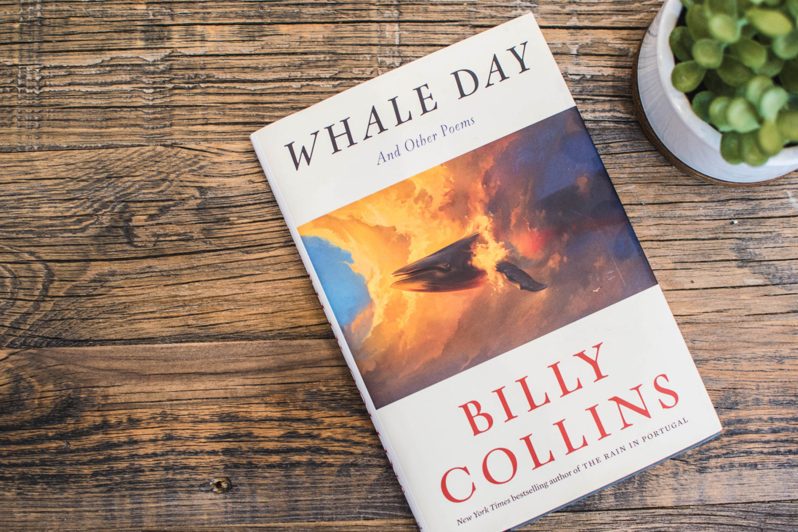 Billy Collins' newest book, "Whale Day: And Other Poems" lays on a coffee table.