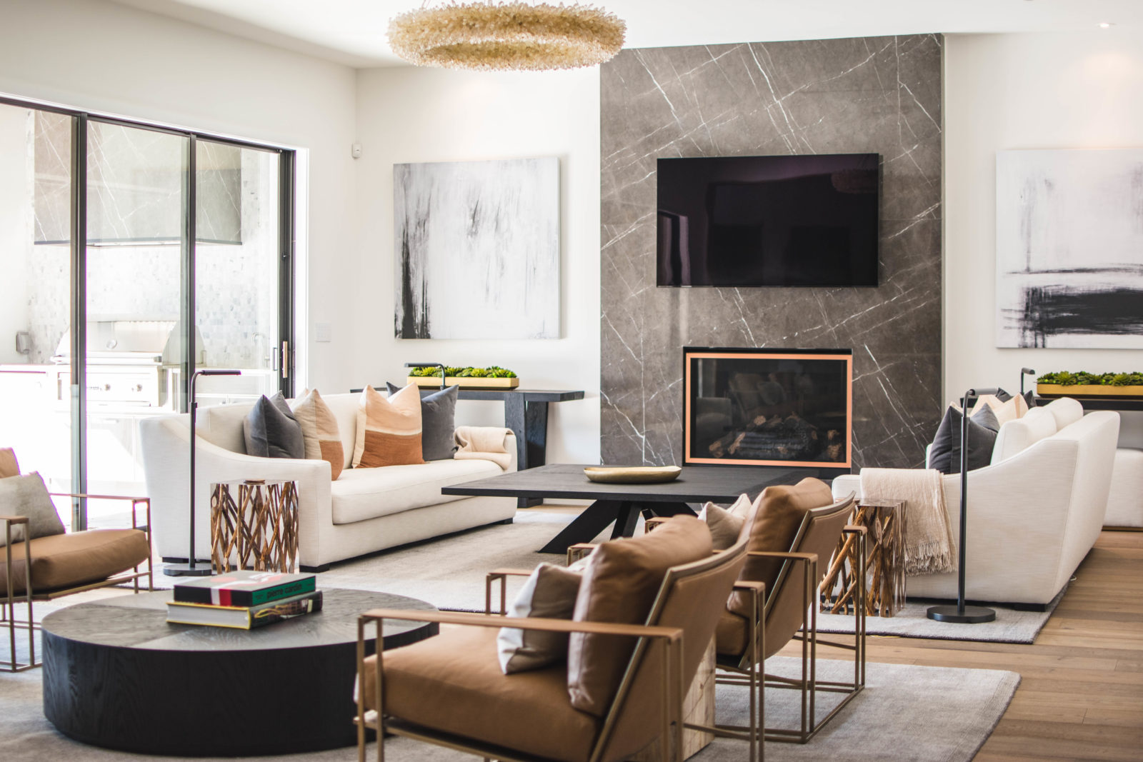 Neutral modern living room with fireplace.